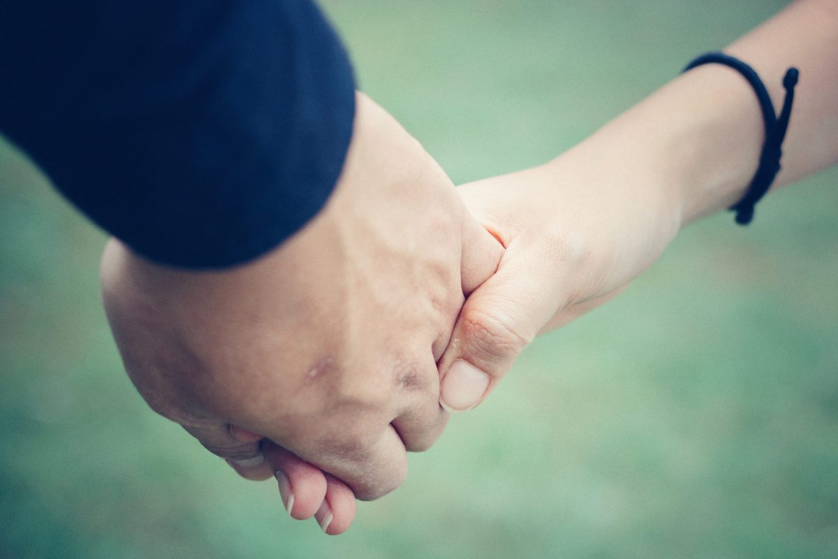 Do you need a will if you are married - man and woman holding hands